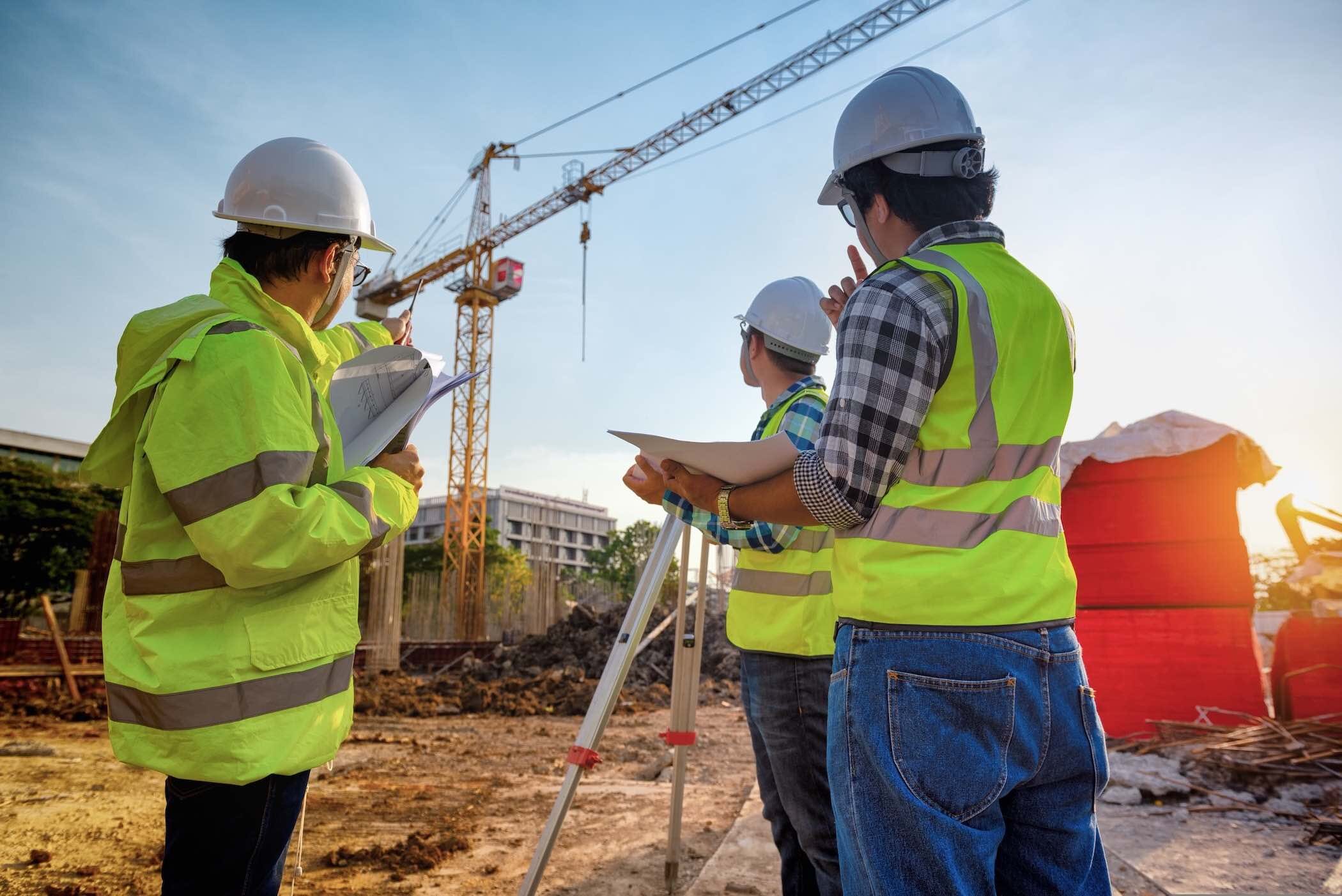 Construction,Engineers,Discussion,With,Architects,At,Construction,Site,Or,Building